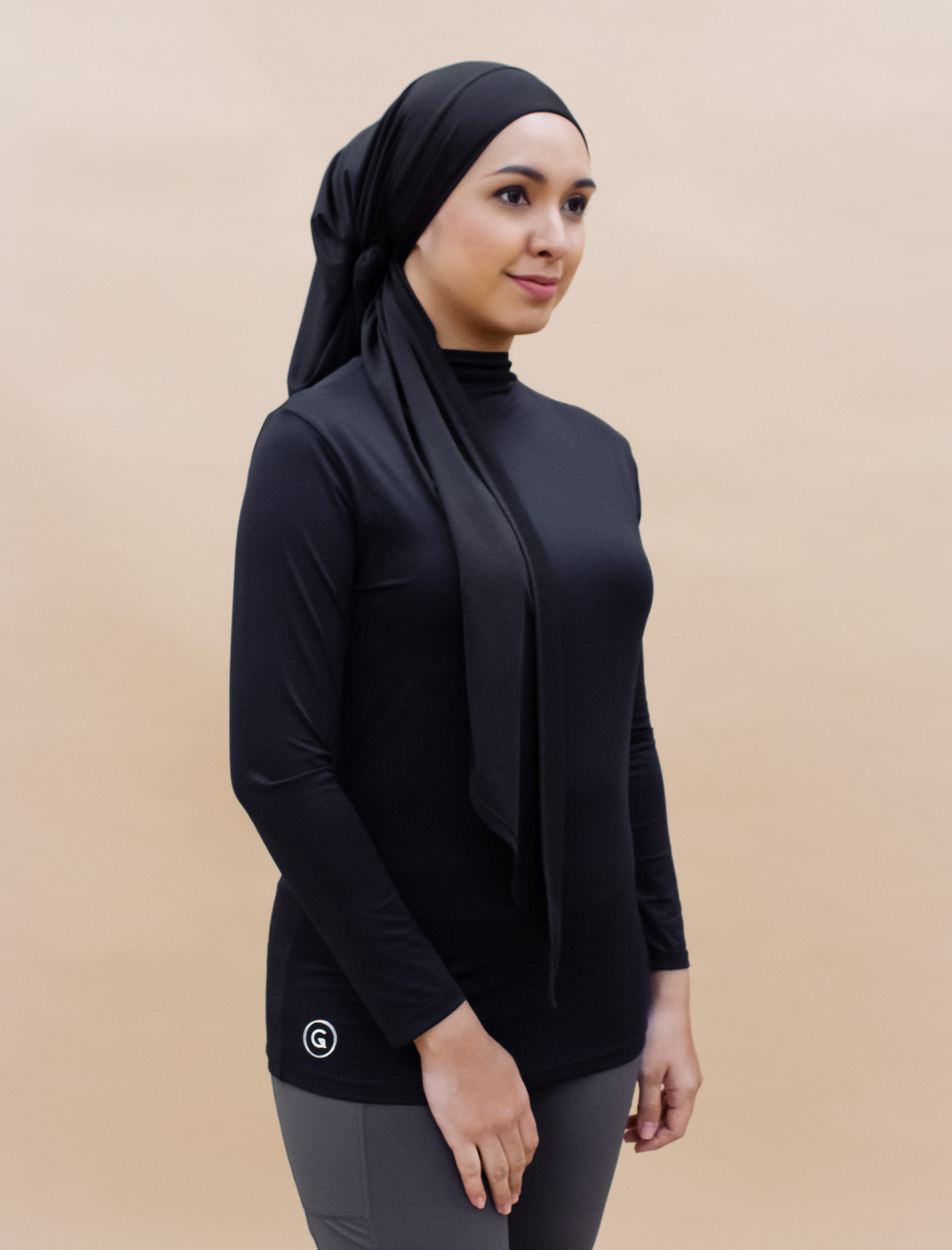 AirLite InnerGlow Mock Neck Top in Black