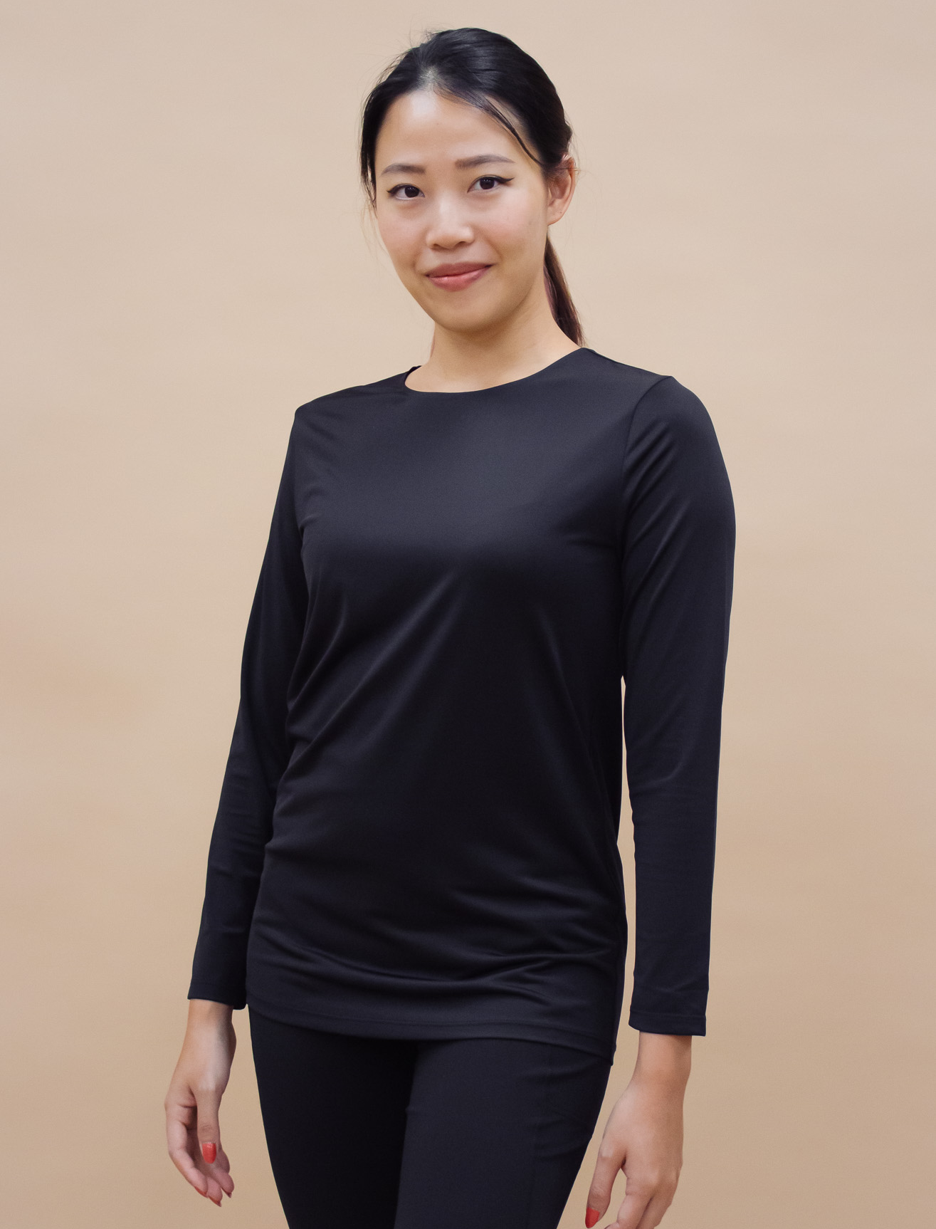 AirLite InnerGlow Crew Neck Top in Black